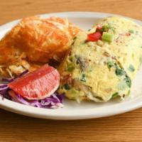 Vegetarian Omelette · Four large eggs, spinach, zucchini, red bell pepper, mushrooms, green onions, garlic, and ja...