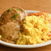 Biscuits & Gravy · Homemade buttermilk biscuit topped with creamy vegetarian mushroom gravy. Served with two eg...