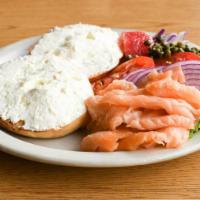 Lox & Bagel · Cold smoked nova lox, served with thin sliced red onion, sliced tomato, capers and a toasted...