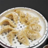 Jjin Mandu / 찐만두 · Steamed dumpling.