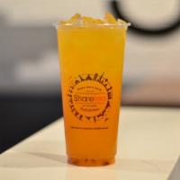 Mango & Passion Fruit Green Tea · Green tea shaken with our mango puree and passion fruit jam. Does not come with any toppings...