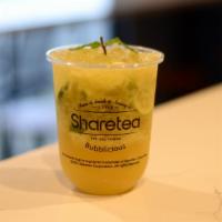 Lime Mojito · Mocktail made with green tea, fresh limes, crushed ice. Cannot modify ice levels or add topp...
