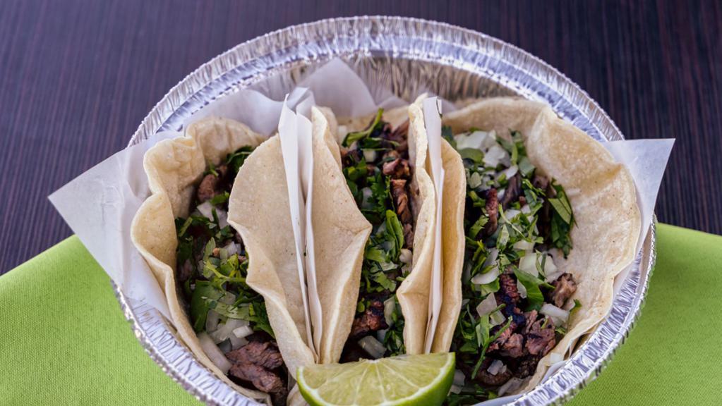 Mexican Street Tacos · 3 Fresh made corn tortillas topped with your choice of protein, cilantro and onion