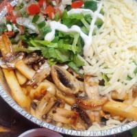Ranchero Fries · A bed of Fries, choice of protein, cheese, romaine lettuce, pico de gallo, Mexican sour crea...