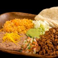 #12 Adobada Plate · Marinated pork served with guacamole, pico de gallo, lettuce, rice, and beans.