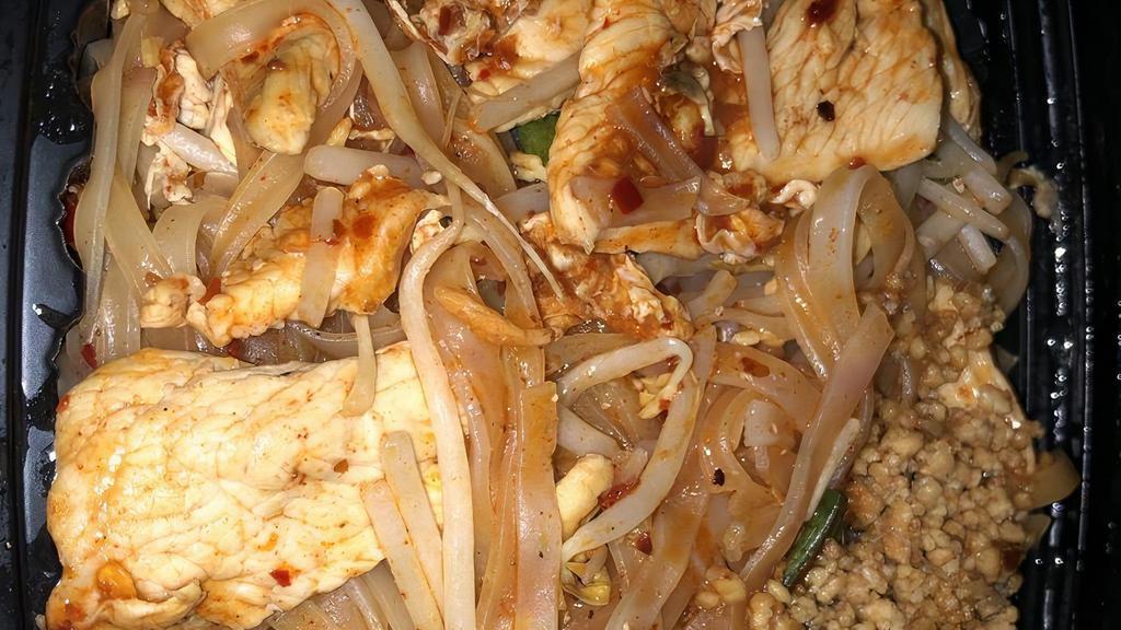 Pad Thai · Stir-fried rice noodles with egg, bean sprouts, ground peanuts, and green onion.