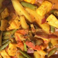 Vegan Lunch Plate · Stir-fry veggies with organic tofu or tempeh, veggies, savory beans, basmati rice, lentil ve...