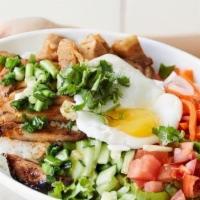 The Bussin Bowl ( Contains Gluten) · Grilled pork chop, braised pork belly and a sunny side egg served with lettuce, pickled daik...