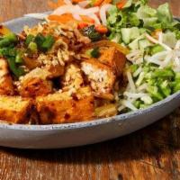 Savory Spicy Lemongrass Tofu Vermicelli ( Contains Onions/ Scallions, Gluten) · Wokfried white onion and lemongrass tofu served with mint, lettuce, pickled daikon carrot, s...