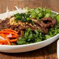 Grilled Short Ribs Vermicelli (Contains Gluten) · Grilled marinated boneless short ribs served with mint, lettuce, pickled daikon carrot, sata...