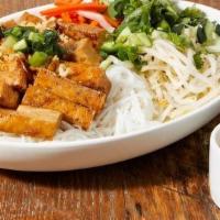 Sweet Dark Soy Tofu Vermicelli ( Contains Gluten) · Sweet Dark soy sauce glazed tofu served with mint, lettuce, pickled daikon carrot, satay sca...
