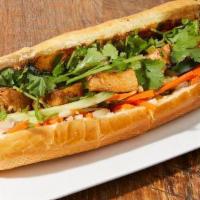 The Smokey Banh Mi · Your choice of proteins stuffed with pickled daikon carrot, scallions, cucumber, jalapenos, ...