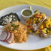 Seafood  Tacos Combo · Two homemade corn tortilla tacos filled with your choice of fish or shrimp. Served with rice...