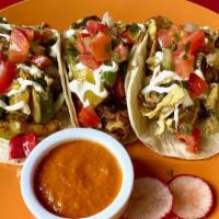 Single Meat  Taco · Our homemade corn tortilla taco filled with your choice of protein (meat or veggies) and top...
