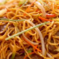  Wok Noodles · Miki Noodles, Carrots,Green Beans, Yellow Onion,Green Onion, Bok  Choy  
Choice of: Chicken ...