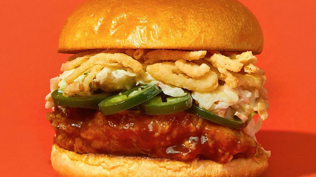 Bbq Sandwich · Our signature fried chicken served on a toasted bun and topped with crispy onions, pickled jalapeno, coleslaw, and BBQ sauce.