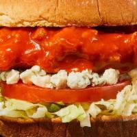 Buffalo Chicken Sandwich · Our signature fried chicken served on a toasted bun and topped with lettuce, tomato, blue ch...