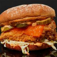 Hot Mama Sandwich · Fried chicken with velveeta cheese, coleslaw, pickles, spicy agave, and our special chick sa...