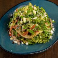 Vegan Tostada Salad · Romaine Lettuce, Black Beans, Grilled Corn, Tomato, Red Onion, Avocado, Vegan Cheese, Jalape...