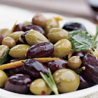 Marinated Olives · Tossed in harissa & preserved lemon.