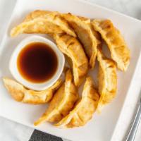 Pot Stickers · Fried dumpling filled with ground chicken and vegetables. Served with homemade sweet soy sau...