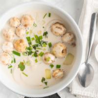 Tom Kha · Coconut milk soup with lemongrass, galangal, onion, lime leaves, mushrooms, chili paste and ...