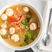 Tom Yum · Lemongrass soup with galangal, chili paste, lime leaves, onion, mushrooms, tomato and cilant...
