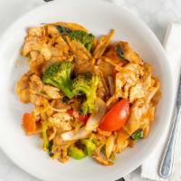 Pad Kee Mao · Stir fried wide rice noodles with egg, broccoli, tomato, onion, basil, bell pepper and chili...