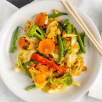 Golden Noodles · Wide rice noodle with egg, onion, green bean, carrot, broccoli and basil stir fried in red c...