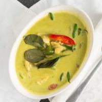 Green Curry · Spicy. Green curry paste in coconut milk with bamboo shoots, eggplant, bell pepper, green be...