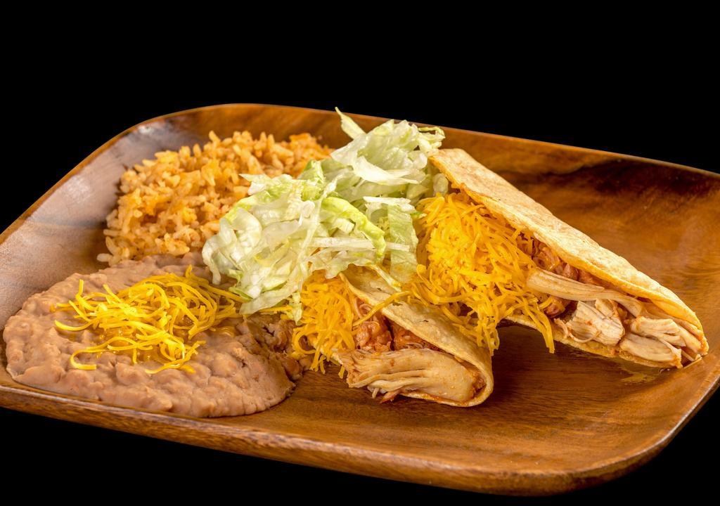 #10 Two Chicken Tacos · Two hard shell chicken tacos with lettuce and cheese served with rice and beans.