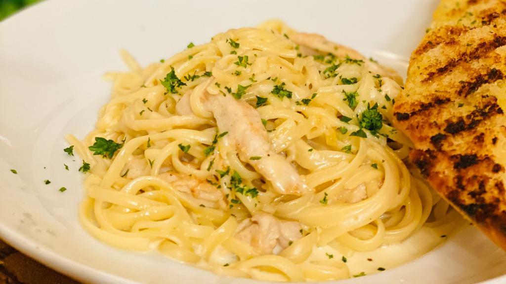Chicken Alfredo · Sautéed chicken tossed in linguini pasta and a Parmesan cream sauce.