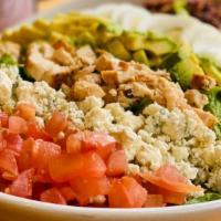 Cobb Salad · Romaine with grilled chicken breast, bacon, avocado, tomatoes, Blue cheese and egg crumbles ...