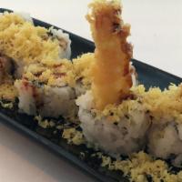 Crunch Roll · Shrimp tempura, crabmeat, topped w/ crunch flakes, & eel sauce.
