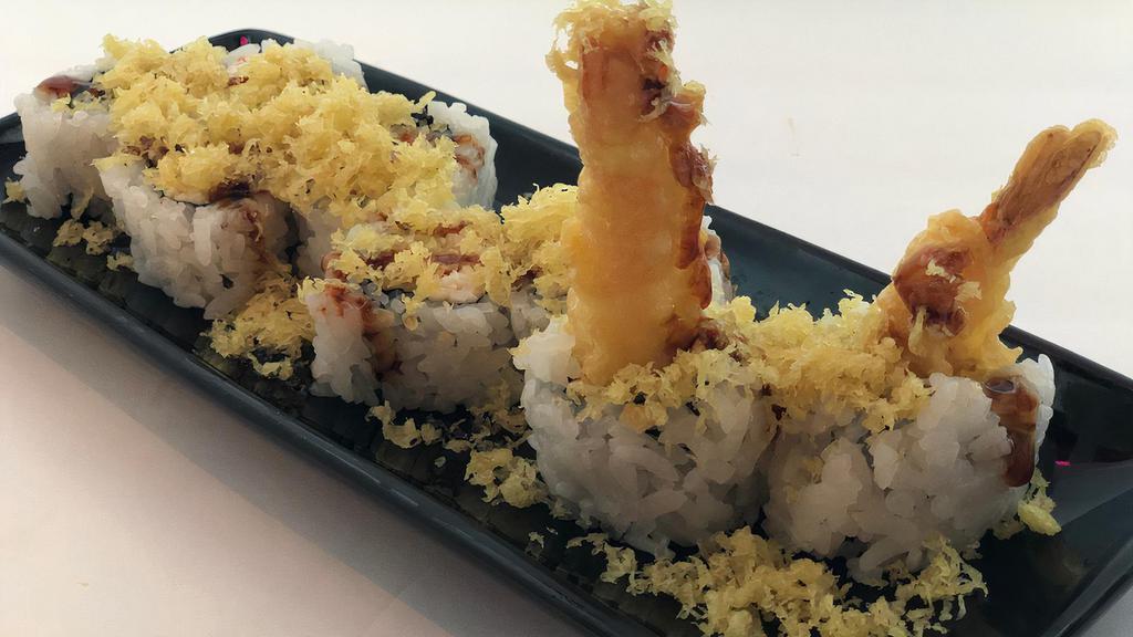 Crunch Roll · Shrimp tempura, crabmeat, topped w/ crunch flakes, & eel sauce.