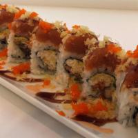 Super Spider Roll · Soft shell crab, crabmeat, cucumber, avocado, topped with spicy tuna, crunch flakes, tobiko,...