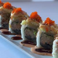 Fisherman Roll · Crabmeat, avocado, cucumber, topped w/ deep fried snapper, spicy mayo, eel sauce & tobiko