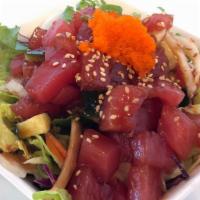 Ahi Tuna Poke Salad · Diced tuna, cucumbers, onions, tobiko, sesame oil, lemon & ponzu sauce.