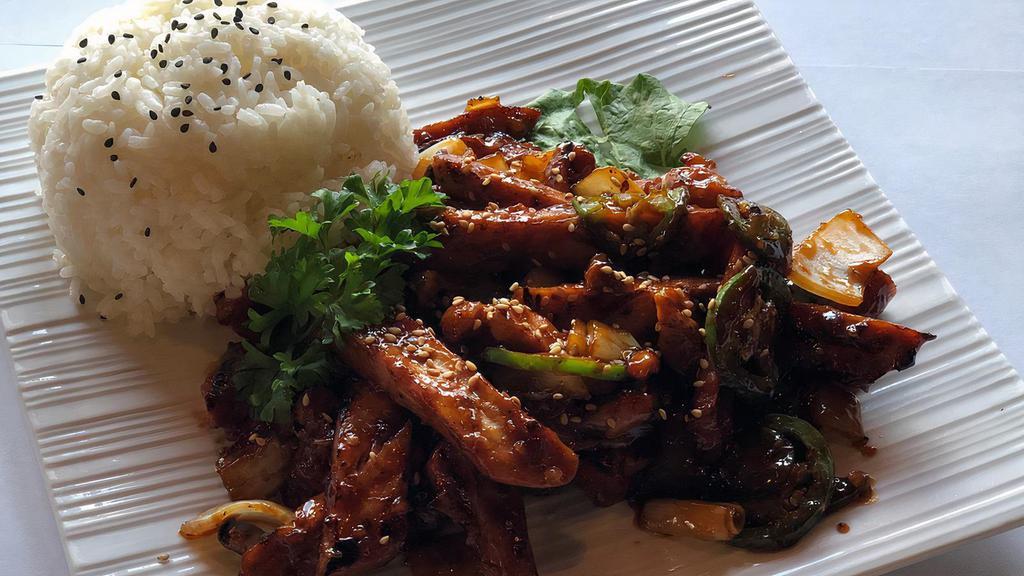Spicy Chicken Teriyaki · Grilled chicken w/house spicy sauces and jalapeños, served with rice, salad.