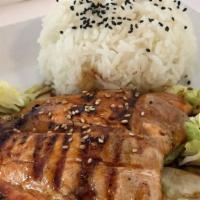 Salmon Teriyaki · Grilled salmon w/ teriyaki sauce, served with rice, salad.