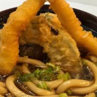 Tempura Udon · Udon noodle soup served w/ tempura shrimp & vegetables.