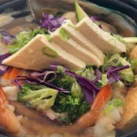 Seafood Nabeyaki Udon · Udon noodle soup served w/ an assortment of seafood & tofu.