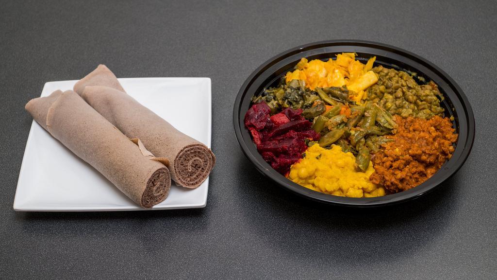 Vegetarian Combo · A sampler plate of misir wot, ater kik, gomen and tikil.