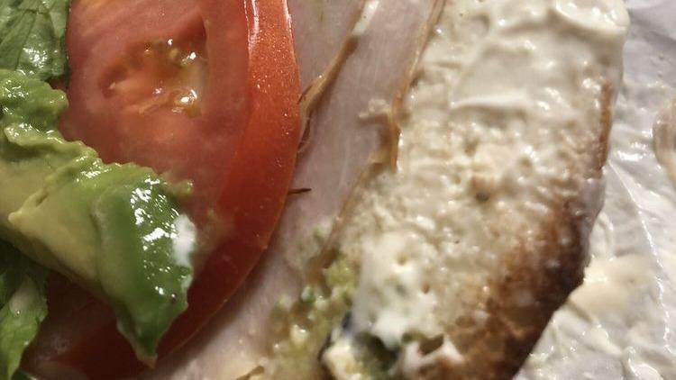 Classic Turkey · Oven roasted turkey breast, honey mustard, lettuce, tomatoes, Provolone cheese, and mayo.