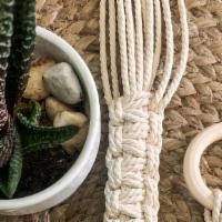 Macramé Hanger - Low Hang · Made with cotton cord and wooden ring. Knot can be changed to hang higher or lower.