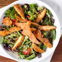 Asian Salad · Grilled chicken tossed in a tangy cilantro orange sauce, sesame seeds, spring mix, romaine, ...