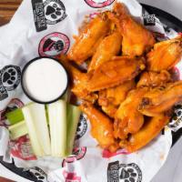Chicken Wings · 10 pieces. Served with celery sticks and choice of ranch or blue cheese dressing.