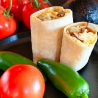 Potato & Egg Burrito With Cheese · Vegetarian Fresh scrambled eggs, our breakfast potatoes with cheddar cheese wrapped in an ex...