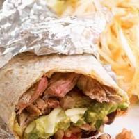 Steak Burrito · Steak, Cheddar Cheese, Black Beans, Corn, Red Onions, Tomatoes, Red Bell peppers, Wrapped in...