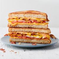 The Regular · 2 fried eggs, bacon, American cheese, tomato & Society Sauce on choice of bread